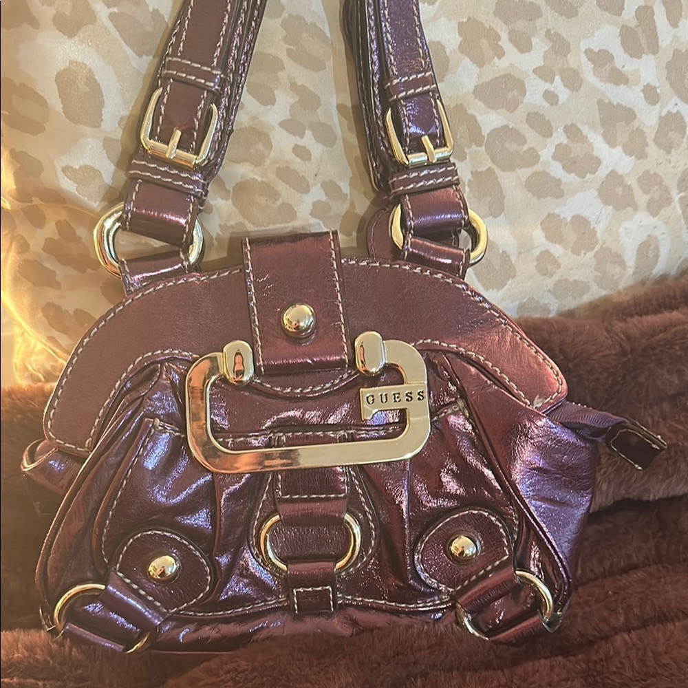 Guess Purple Mini Bag with Chic Design